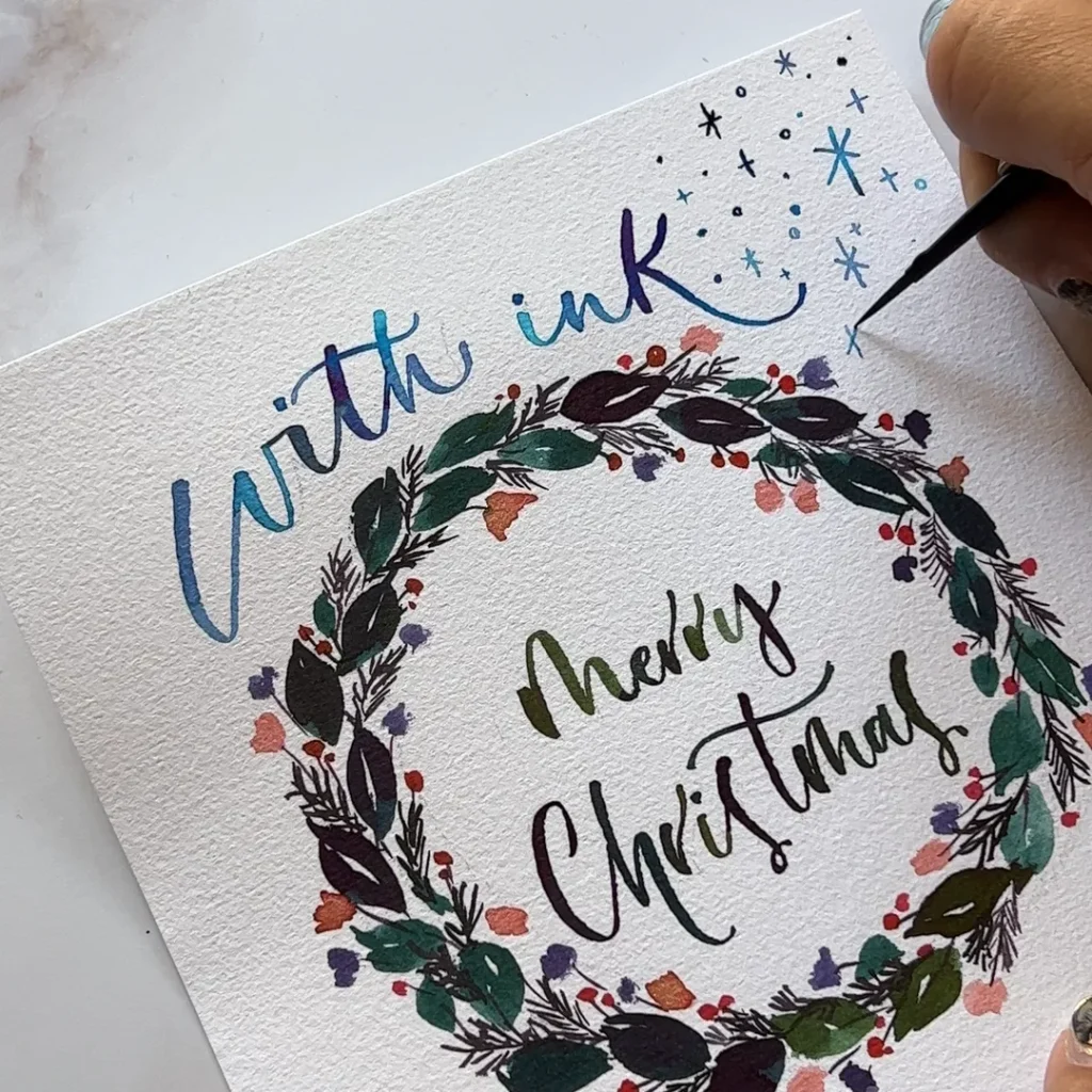 with inkと雪の結晶を描いている写真