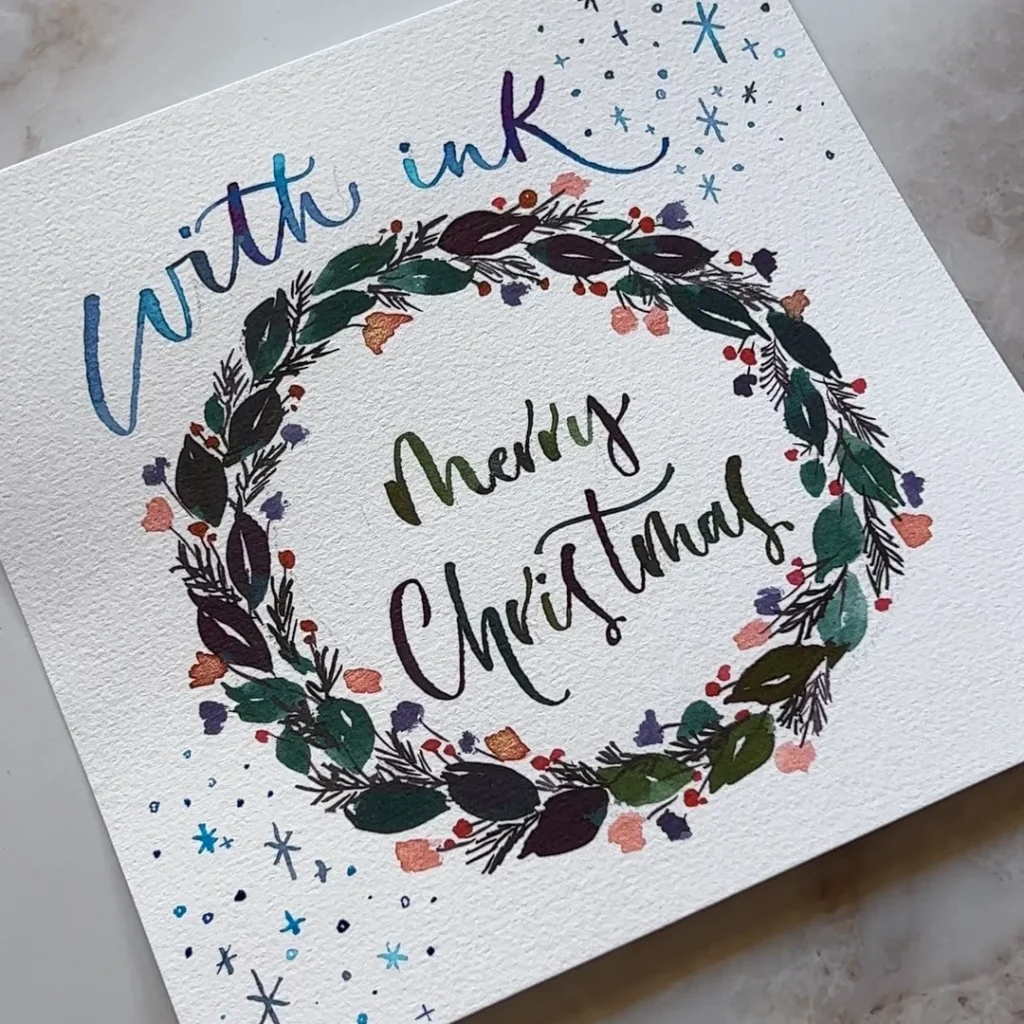 with ink.と雪の結晶が描き上がった状態の写真