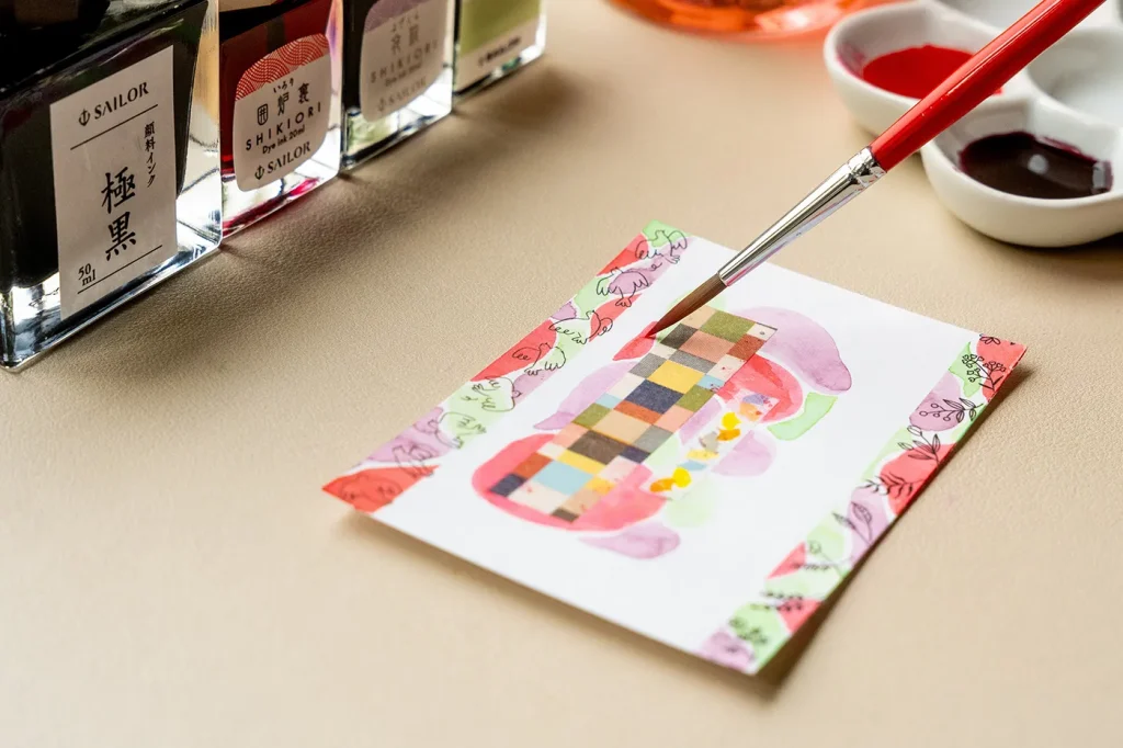 メッセージエリアの周りをインクで塗っている様子