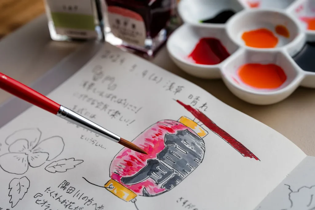 スケッチに色を塗っている様子